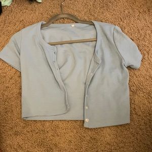 Child’s Large Blue Amazon button up tshirt